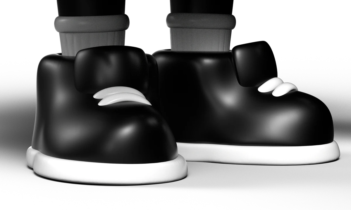 Nahaufnahme der schwarzen Sneaker mit weißer Sohle